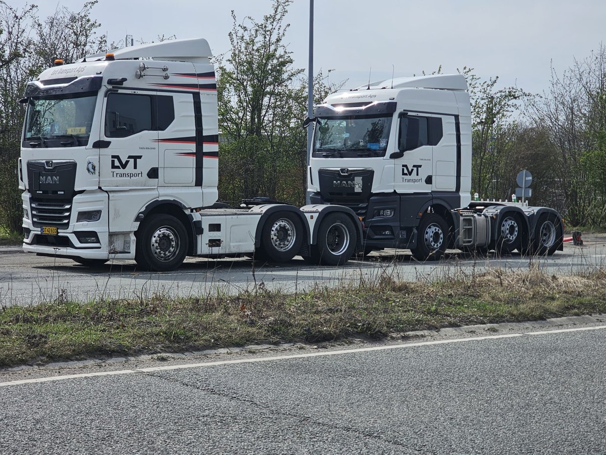 Two white LVT tractor units parked together